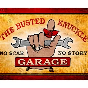 A vintage-style garage logo featuring a hand with tools and bold text.