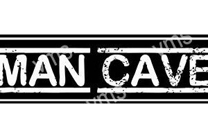 A black and white sign reading 'MAN CAVE'.