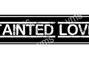 Black and white sign with worn text 'WANTED LO'.