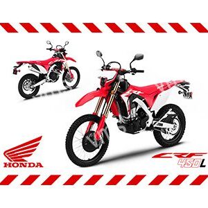 Red and white Honda off-road motorcycle with bold design.