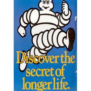 Michelin Man walking with a message about longer life.