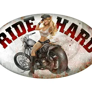 A woman in a cowboy hat sits on a motorcycle with 'Ride Hard' text above.