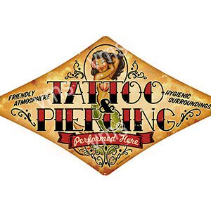 Vintage sign for Tattoo Piercing with decorative elements.