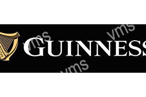 Close-up of the Guinness logo on a black background.