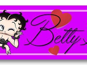 Betty Boop illustration with hearts on a bright pink background.