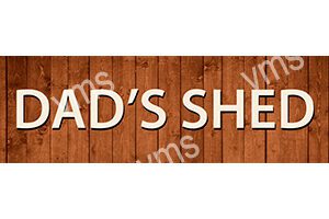 A wooden sign with the text "DAD'S SHE" in bold white letters.