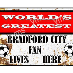 A sign stating "World's Greatest Bradford City Fan Lives Here" with a soccer ball.