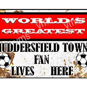 A vintage sign declaring a Huddersfield Town fan lives here.