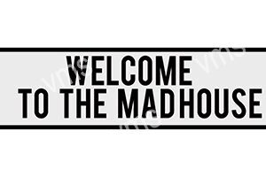 A black and white sign saying 'WELCOME TO THE MADHOUSE'.