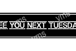 Black and white sign saying 'YOU NEXT TUE' with some parts unclear.