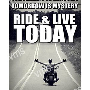 Motorcyclist riding with arms outstretched, embracing the moment.