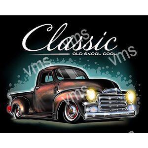 Vintage classic pickup truck with a rustic look and glowing headlights.
