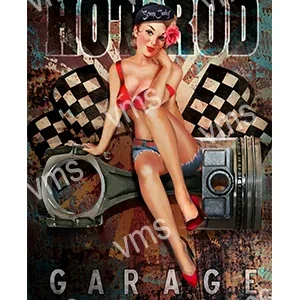 Retro pin-up girl posing with a vintage hot rod car.