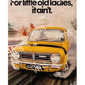 Vintage yellow car speeding with the slogan 'For little old ladies, it ain't.'