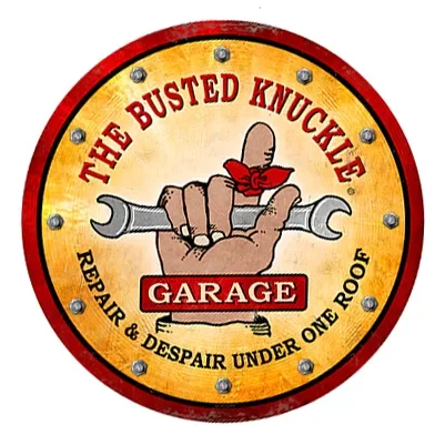 Vintage-style garage logo with a hand holding a wrench and a red glove.