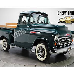 Classic black Chevy truck with vintage design and wooden bed.
