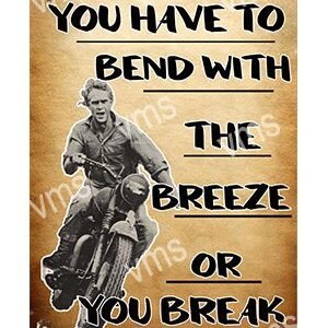 Motivational poster with a man riding a motorcycle and inspirational text.