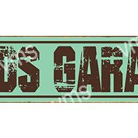 Rustic metal sign with worn paint reading 'BUS GARAGE'.