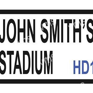 Close-up of a sign reading 'John Smith's Stadium'.