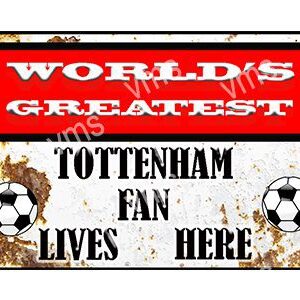 Vintage sign stating a Tottenham fan lives here with a soccer ball.