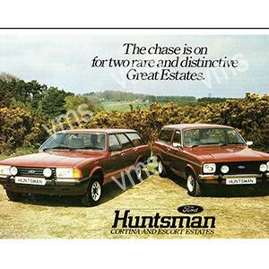 Two classic Great Estates cars in a scenic outdoor setting.
