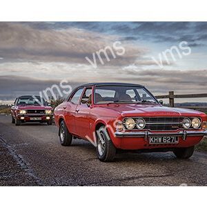 Classic red sports car leading a convoy on a cloudy day.