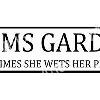 Black and white sign with a partially visible text about a garden.