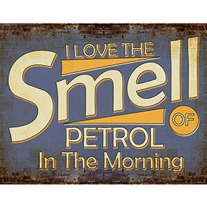 Vintage sign saying 'I love the smell of petrol in the morning'.