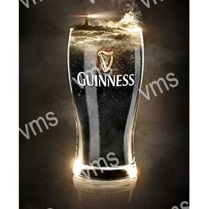 A tall glass of Guinness beer with a creamy head against a dark background.