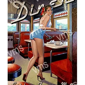 Pin-up style woman posing in a retro diner with vintage decor.