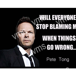 Man in suit with a motivational quote about blame and mistakes.