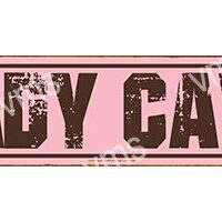 A pink rectangular sign with distressed text reading 'CANDY CA'.