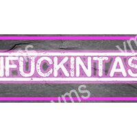 Neon sign displaying the word 'FUCKINTAS' in bright pink.