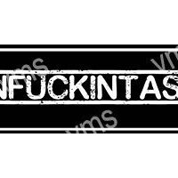 Black and white image with partially visible text 'UNFUCKINTAS'.