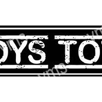 Grungy black and white street sign reading 'BOYS TOY'.