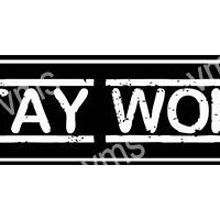 Black and white street sign saying 'STAY WOKE'.