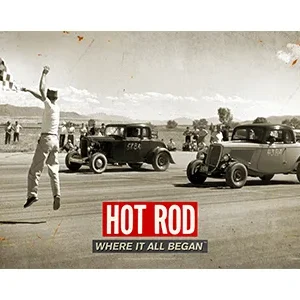 Vintage photo of early hot rod cars and a man celebrating.