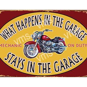 Vintage sign about garage secrets with a motorcycle.