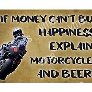 Graffiti stating money can't buy happiness, but can buy motorcycles and beer.