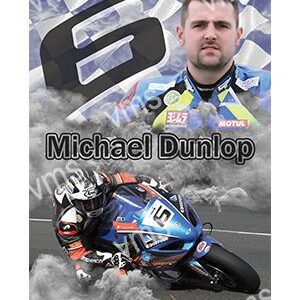 Michael Dunlop racing on a motorcycle with intense focus.
