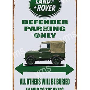 Vintage Land Rover Defender parking sign with humor.
