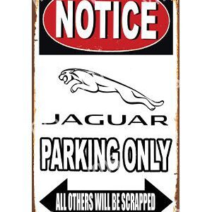 Jaguar parking only sign with a bold notice.