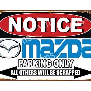 Notice sign for Mazda parking only with a warning to scrap other vehicles.