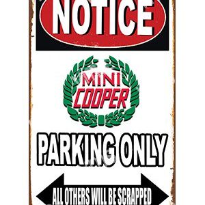 A humorous parking sign for Mini Cooper owners only.