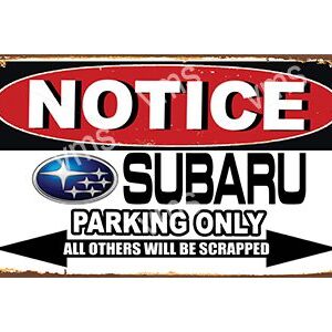 Notice sign for Subaru parking only.