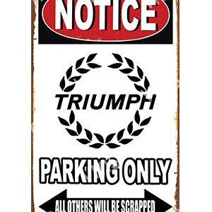 Triumph parking only sign with a warning about scrapping others' vehicles.