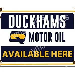 Vintage Duckhams motor oil sign with bold text.