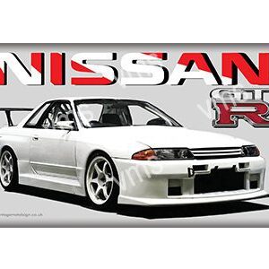 White Nissan Skyline R32 sports car with bold logo.