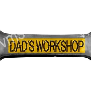 A metal sign that reads 'DAD'S WORKSHOP' in bold letters.
