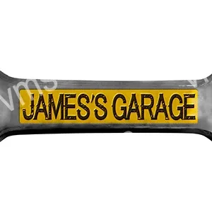 A yellow and black sign reading 'JAMES'S GARAGE'.